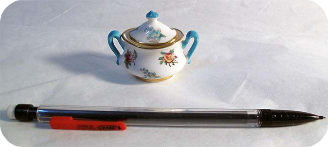 a tiny porceline tea pot