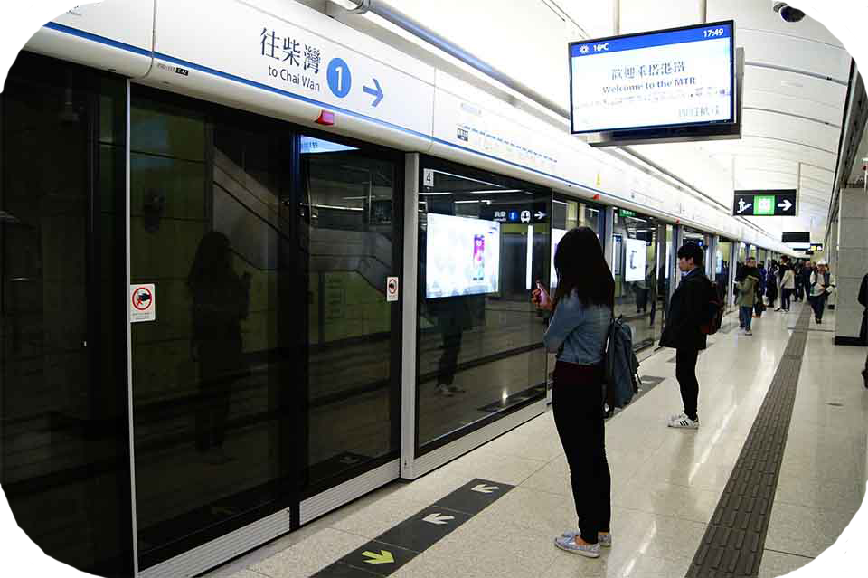 a busy subway train stop.
